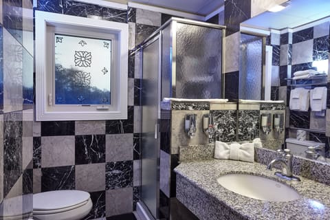 Presidential Suite, 2 Bedrooms, Balcony | Bathroom | Combined shower/tub, hair dryer, towels