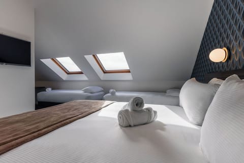 Standard Room, Multiple Beds | Pillowtop beds, individually decorated, individually furnished, desk