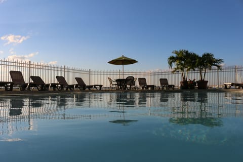 Indoor pool, outdoor pool, pool umbrellas, sun loungers