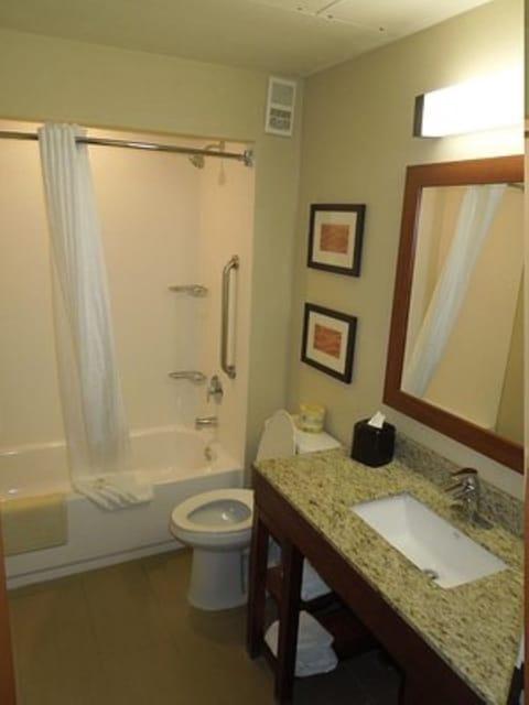 Combined shower/tub, hair dryer, towels, soap