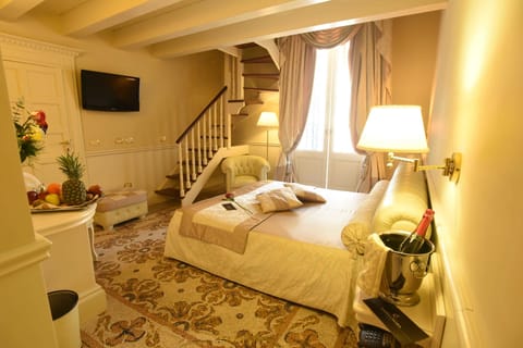 Family Room, 2 Bathrooms | Premium bedding, minibar, blackout drapes, free WiFi