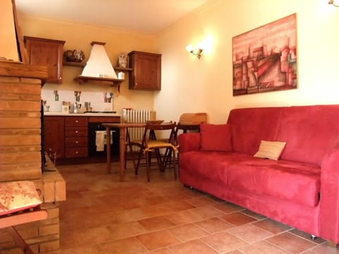 Apartment, 1 Bedroom, Ground Floor | Living area | 32-inch flat-screen TV with digital channels, TV, fireplace