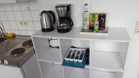 City Apartment | Private kitchen | Full-size fridge, microwave, stovetop, coffee/tea maker