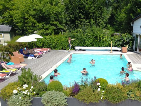 Seasonal outdoor pool, pool umbrellas, sun loungers