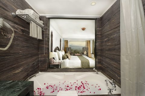 Royal Suite, Multiple Beds, Bathtub, River View | Bathroom | Designer toiletries, hair dryer, towels, soap