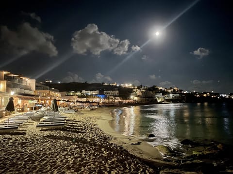 On the beach, sun loungers, beach umbrellas, beach towels