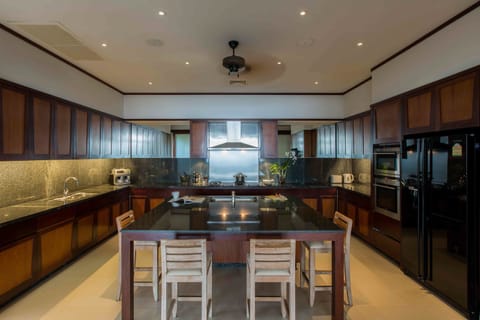 Luxury Villa | Private kitchen | Full-size fridge, microwave, oven, stovetop