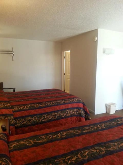 Standard Room, 2 Queen Beds | Individually furnished, desk, blackout drapes, iron/ironing board