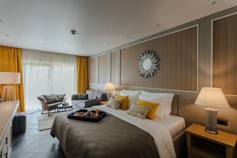 Junior Suite, Balcony, Partial Sea View | Frette Italian sheets, premium bedding, minibar, in-room safe