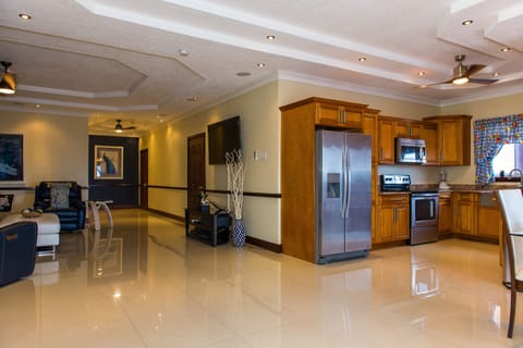 Family Apartment, Mountain View | Living area | 50-inch flat-screen TV with cable channels, TV, DVD player