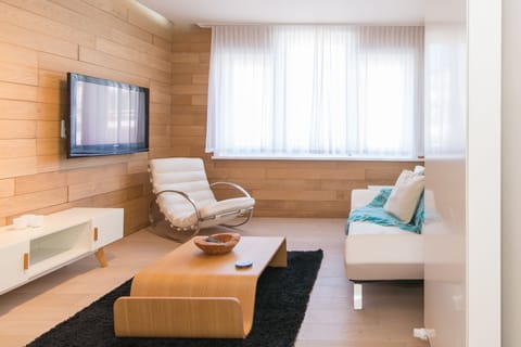 Comfort Apartment | Living room | Flat-screen TV