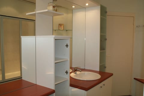 Apartment, 2 Bedrooms | Bathroom | Combined shower/tub, deep soaking tub, hair dryer, towels