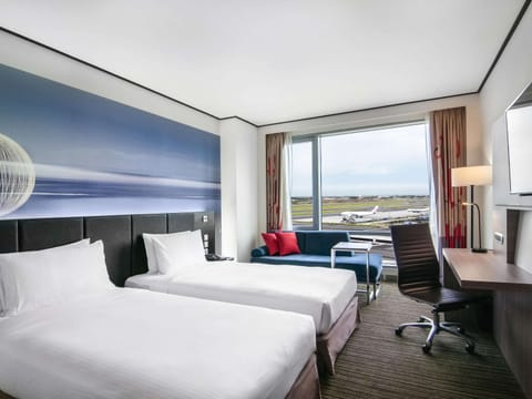 Superior Twin Room, 2 Twin Beds (Airport View) | Down comforters, in-room safe, desk, soundproofing