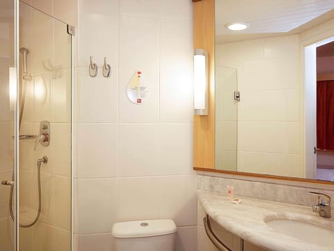 Shower, eco-friendly toiletries, hair dryer, towels