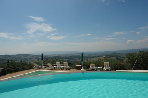 Outdoor pool, open 8:30 AM to 6:00 PM, pool umbrellas, sun loungers