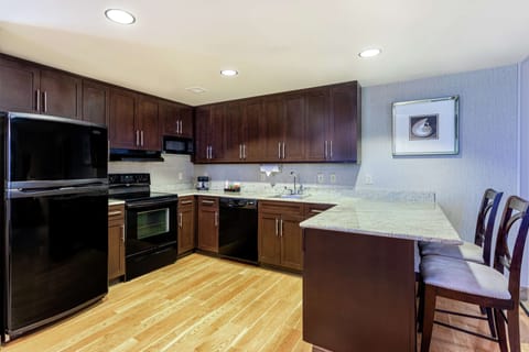 Presidential Two King and One Sofa Bed Non-Smoking | Private kitchen | Full-size fridge, microwave, stovetop, dishwasher