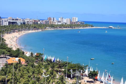 On the beach, white sand, beach towels