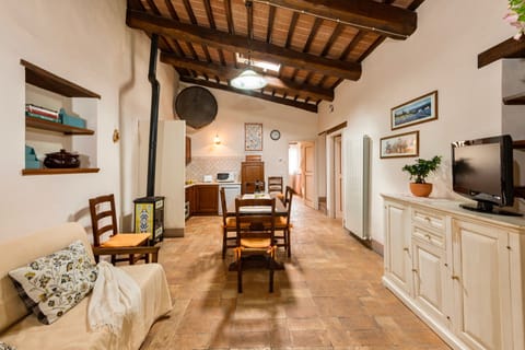 Exclusive Condo | Living room | LED TV, foosball, table tennis, books