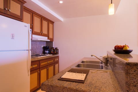 Suite, 1 Bedroom | Private kitchen | Full-size fridge, microwave, stovetop, coffee/tea maker