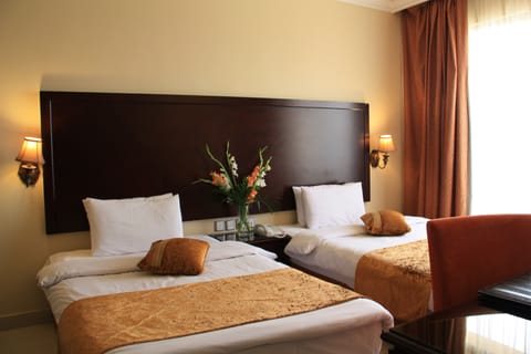 Double Room | Minibar, in-room safe, individually decorated, individually furnished