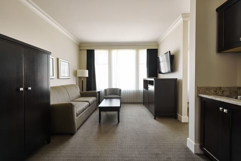 Junior Suite, 1 King Bed | Living room | Flat-screen TV