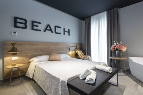 Superior Double Room | Minibar, individually furnished, desk, blackout drapes