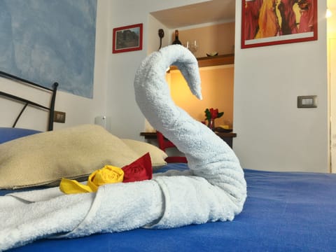 Double Room, Garden View | Down comforters, individually decorated, iron/ironing board, free WiFi