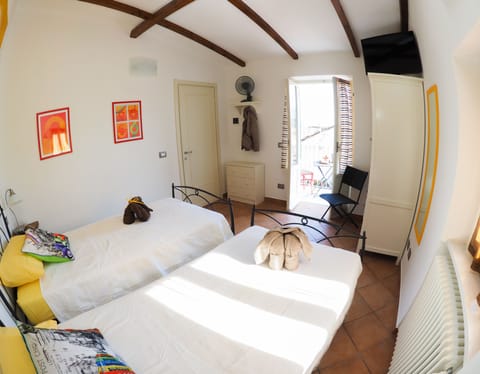 Suite, 2 Bedrooms, Balcony | Down comforters, individually decorated, iron/ironing board, free WiFi