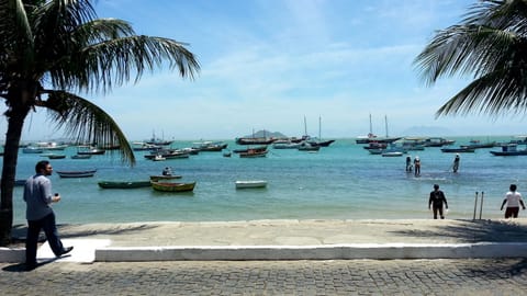 Beach nearby, white sand, beach towels