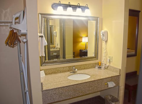 Combined shower/tub, deep soaking tub, free toiletries, hair dryer