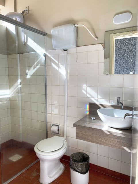 Economy Double or Twin Room | Bathroom | Shower, hair dryer, bidet, towels