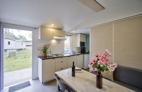 Classic Mobile Home, 2 Bedrooms | Private kitchen | Full-size fridge, stovetop, electric kettle, highchair