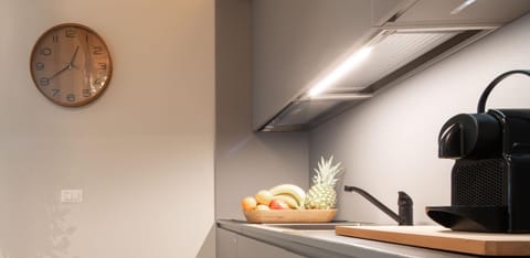 Fridge, stovetop, espresso maker, coffee/tea maker