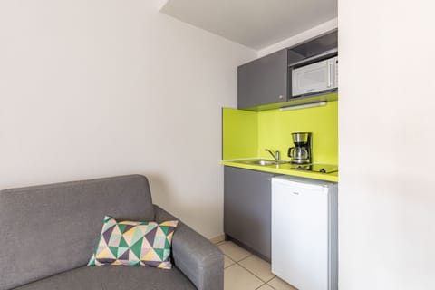 Apartment, 1 Bedroom | Private kitchen | Fridge, microwave, stovetop, coffee/tea maker