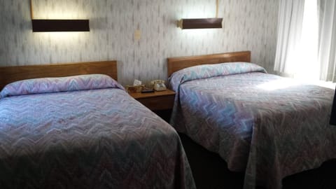 Blackout drapes, iron/ironing board, free WiFi, bed sheets