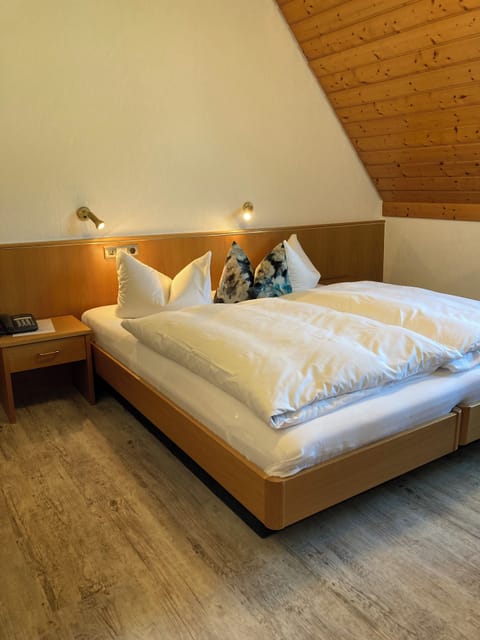 Standard Double Room Single Use (Haupthaus, Gästehaus) | Blackout drapes, iron/ironing board, free WiFi, bed sheets