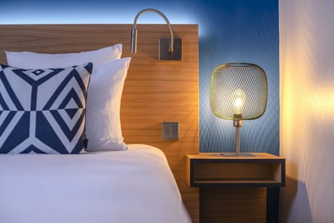 Luxury Room | Premium bedding, desk, blackout drapes, soundproofing