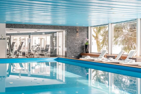 Indoor pool, open 7:00 AM to 8:30 PM, sun loungers