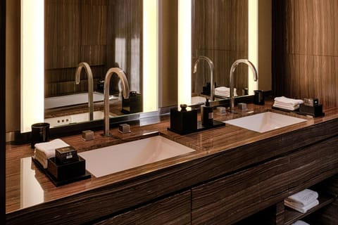 Armani Premiere Suite | Bathroom | Separate tub and shower, designer toiletries, hair dryer, bathrobes