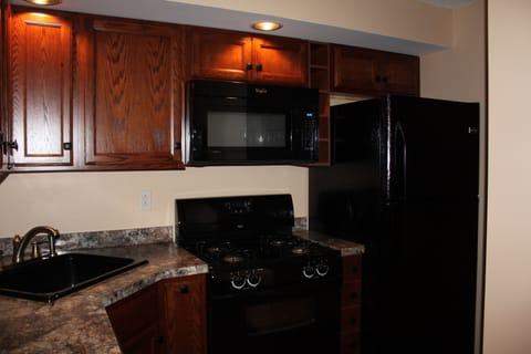 Family Cottage, Multiple Beds, Non Smoking, Fireplace | Private kitchen | Microwave, coffee/tea maker, toaster, cleaning supplies