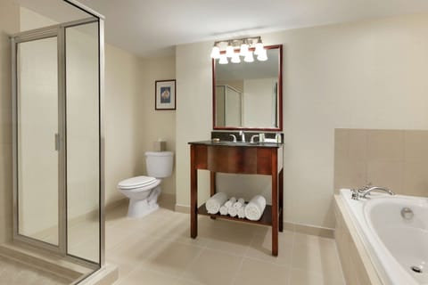 Junior Suite, 1 King Bed, Non Smoking | Bathroom | Eco-friendly toiletries, hair dryer, towels, soap