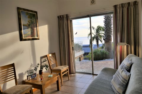 Comfort Apartment, 1 Queen Bed, Ocean View | Living area | LCD TV