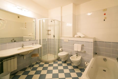 Triple Room, Lake View | Bathroom | Combined shower/tub, free toiletries, hair dryer, slippers