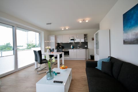 Apartment, 2 Bedrooms, Balcony (incl 90€ cleaning and 12€ service fee) | Living area | Flat-screen TV