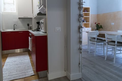 Full-size fridge, microwave, stovetop, coffee/tea maker