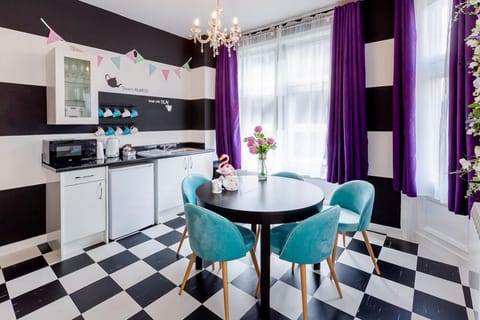 Apartment, Private Bathroom (Mad Hatter's Tea Room) | Restaurant