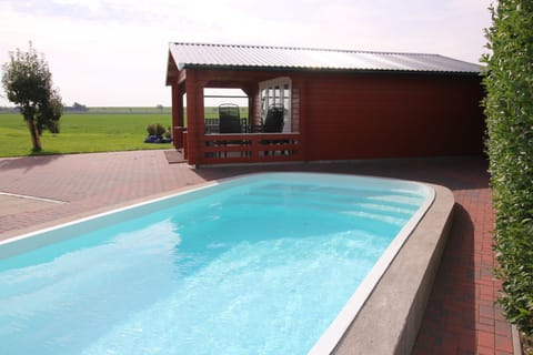 Seasonal outdoor pool, sun loungers