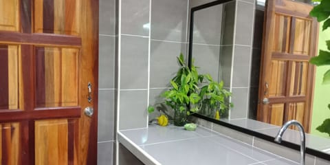 Comfort Room, 1 Queen Bed | Bathroom | Shower, free toiletries, hair dryer, slippers