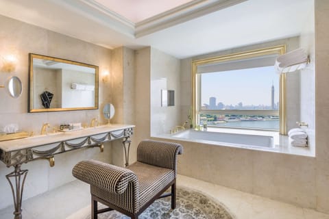 Suite, 1 King Bed, River View | Bathroom | Combined shower/tub, jetted tub, rainfall showerhead