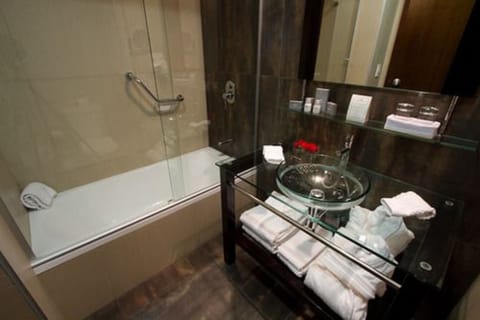 Deep soaking tub, rainfall showerhead, free toiletries, hair dryer